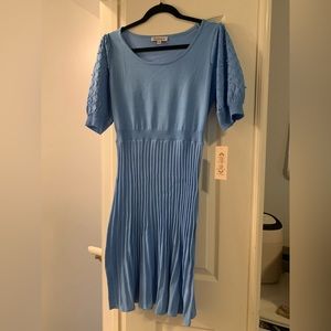 Pretty blue dress with ball and diamond design